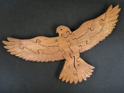 Image of wooden falcon puzzle made of mahogany wood